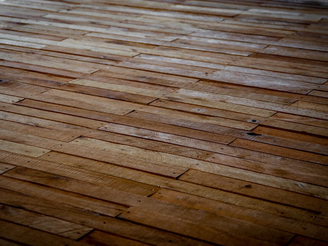 Rustic wood floor with staggered plank end joints