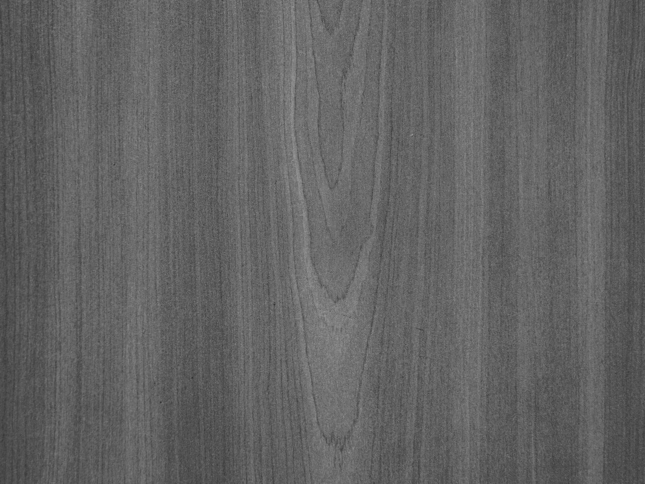 Close-up of a gray wood-grain surface