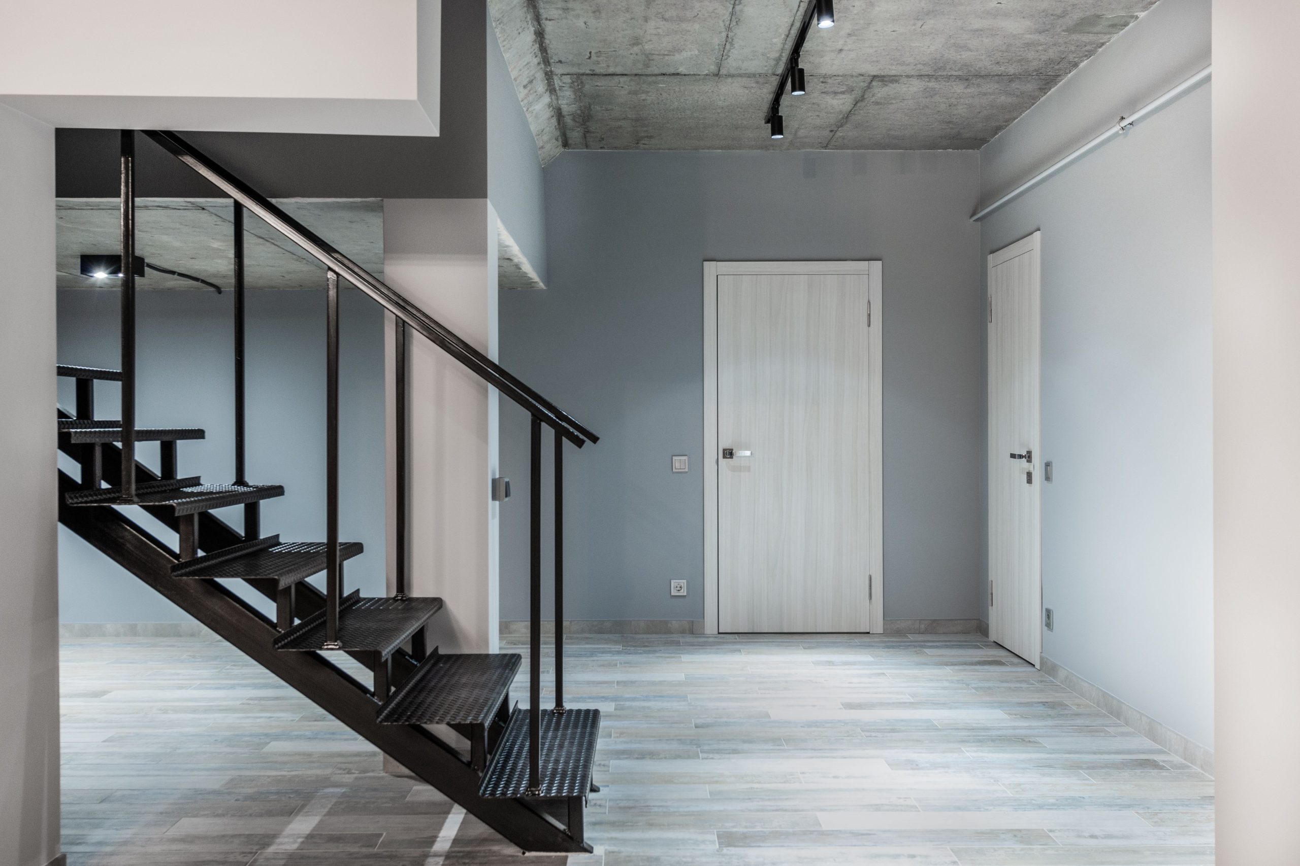 Modern apartment corridor with laminate floor